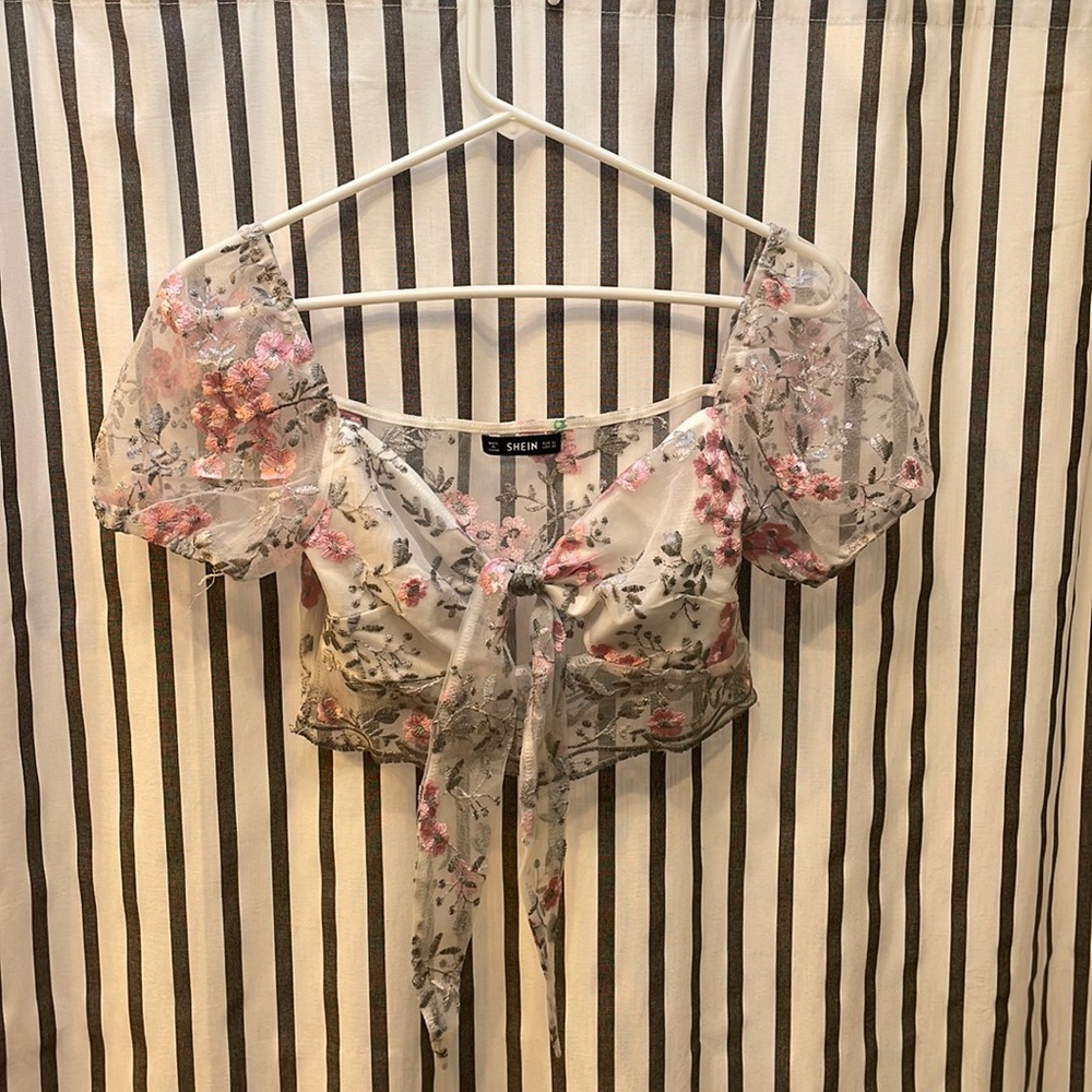 See through shirt , crop top , zips up from the side ,